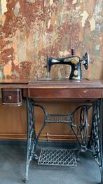 Oude Singer naaimachine, Ophalen
