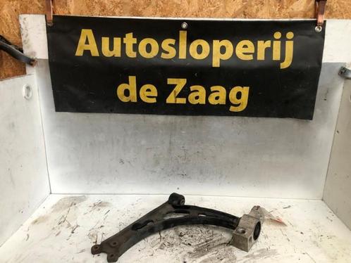 Draagarm rechts-voor van een Volkswagen Touran, Auto-onderdelen, Ophanging en Onderstel, Volkswagen, Gebruikt, 3 maanden garantie