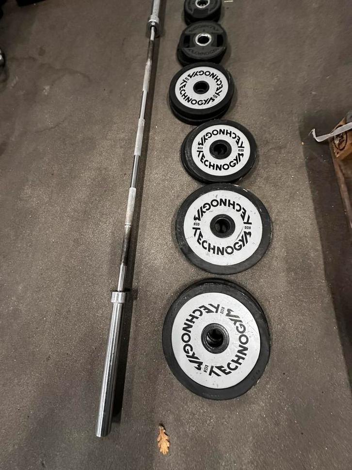 137,5kg Technogym gewichten , Olympische Barbell 220cm, Sport en Fitness, Fitnessmaterialen, Gebruikt, Halterschijven, Ophalen
