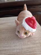 Kerst kat beeldje, Ophalen