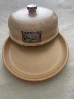 cloche à fromage, Ophalen