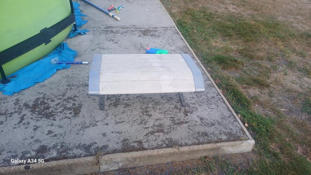 Robotmaaier huisje, Ophalen