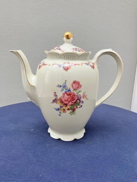 Porseleinen koffiepot, Enlèvement