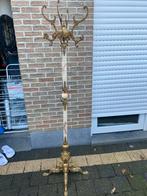 Staande koperen en marmeren kapstok, Ophalen