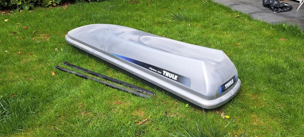 Dakkoffer Thule en dragers, Ophalen