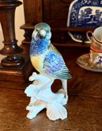 Vogel in porselein, Ophalen