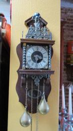 Zaanse klok, Ophalen