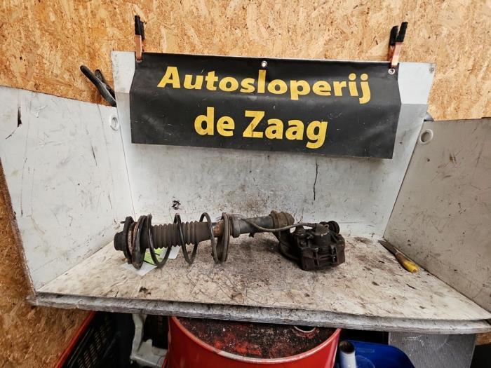 Schokdemperpoot rechts-voor van een Peugeot 106, Auto-onderdelen, Ophanging en Onderstel, Peugeot, Gebruikt, 3 maanden garantie