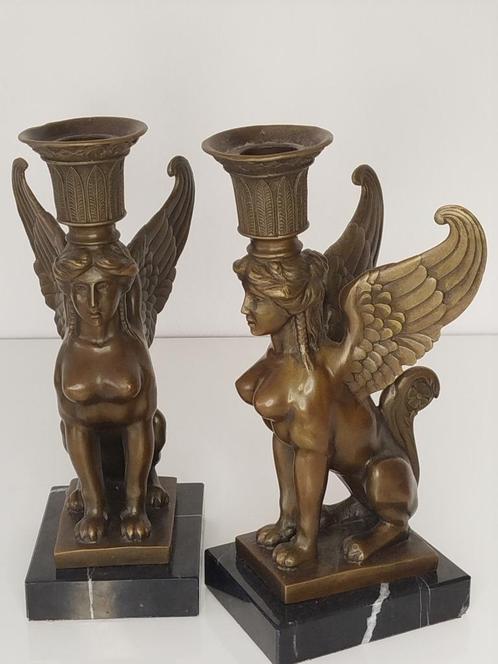 2 bronzen kandelaars in de vorm van een sfinx, Antiek en Kunst, Antiek | Brons en Koper, Brons, Ophalen of Verzenden