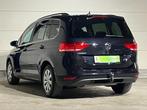 Volkswagen Touran Comfortline 7-zit 1.5 TSi 150 PK DSG-7, Autos, Volkswagen, Carnet d'entretien, 7 places, Noir, Tissu