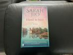 Eiland in bloei - Sarah Jio, Ophalen of Verzenden, Zo goed als nieuw