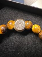 Tomorrowland Winter Bracelet, Handtassen en Accessoires, Kettingen, Ophalen of Verzenden, Nieuw, Bruin, Steen of Mineraal