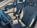 Toyota Yaris 1.5 VVT-i Hybrid 85kW e-CVT Dynamic | Navigatie, Auto's, Gebruikt, 450 kg, Zwart, 5 zetels