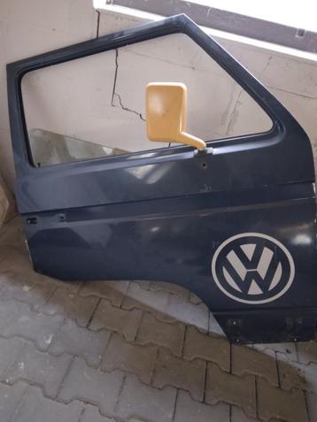 VW T3 Voorportieren L + R, kleur: Blauw met VW LOGO beschikbaar voor biedingen