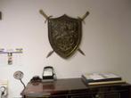 Middeleeuws schild Fleur de lis. Brons en messing, Ophalen