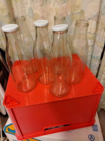 24 glazen flessen van 1 l  beschikbaar voor biedingen