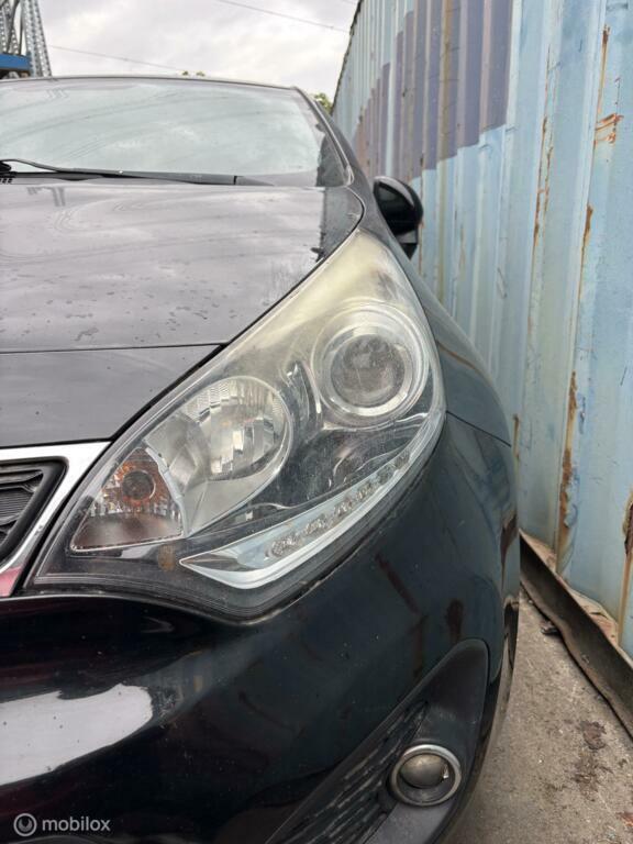 Koplamp links Kia Rio III ('10-'20), Auto-onderdelen, Verlichting, Kia, Gebruikt, Ophalen of Verzenden