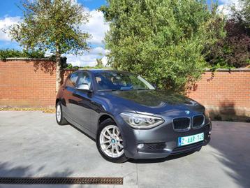 Bmw 118i ~ Bi xenon ~ Lane assist ~ zetelverwarming beschikbaar voor biedingen
