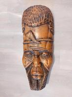 Groot houten beeld, Ophalen