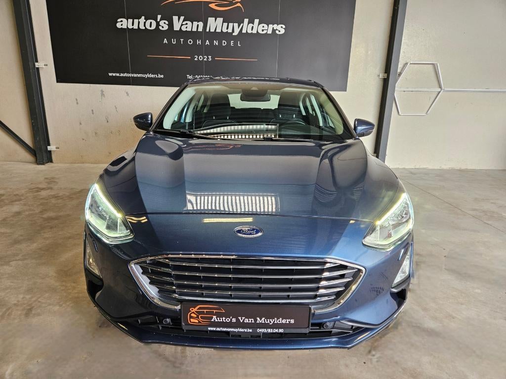 Ford Focus Titanium benzine 12 maanden garantie 52000KM, Auto's, Euro 6, Blauw, Bedrijf, 999 cc