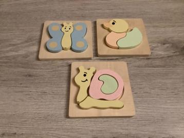 Houten verschillende kinderpuzzle's met dieren  beschikbaar voor biedingen