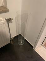 Hoge glazen vaas, Ophalen