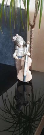 Prachtige Lladro Beeld. " Girl with cello "., Antiek en Kunst, Curiosa en Brocante, Ophalen of Verzenden