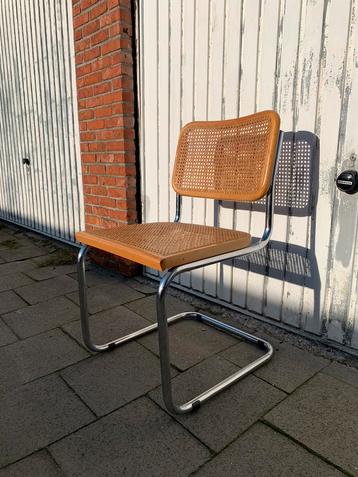 Vintage buisframe stoel met webbing  beschikbaar voor biedingen