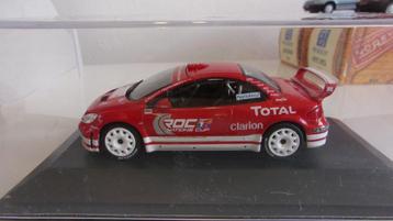 PEUGEOT 307 WRC LOEB.1/43 IXO/ALTAYA en VITRINE NEUTRE beschikbaar voor biedingen