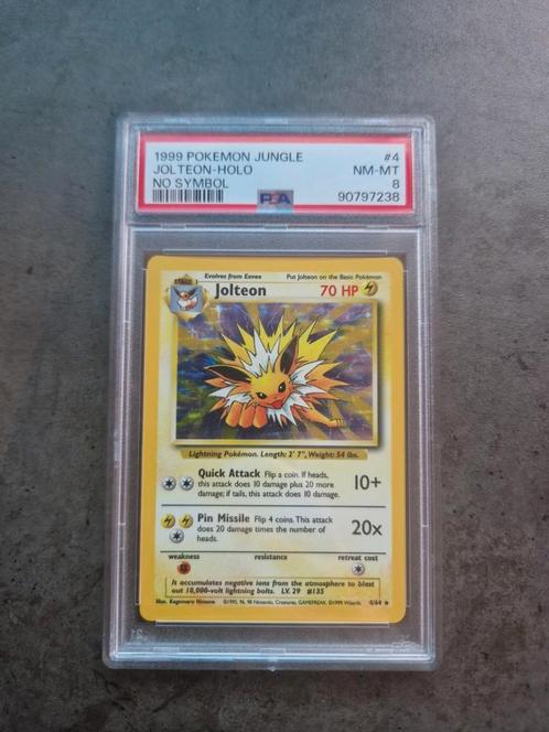 Jolteon Holo Aucune erreur de symbole Jungle PSA 8, Hobby & Loisirs créatifs, Jeux de cartes à collectionner | Pokémon, Comme neuf