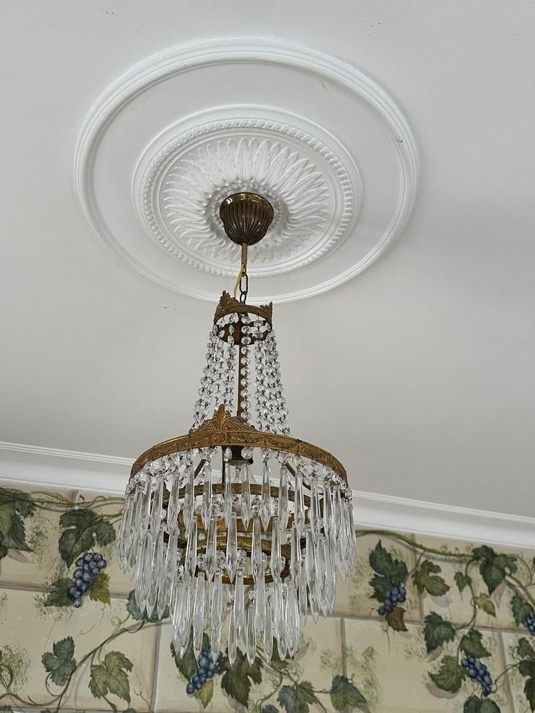 Koperen kroonluchter, Ophalen