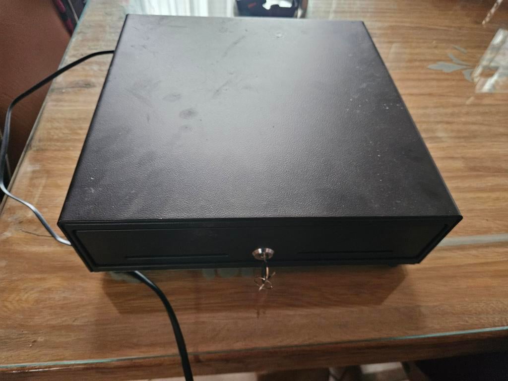 Tiroir caisse, Ophalen