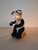 Drinkende panda automaat Japan, Ophalen