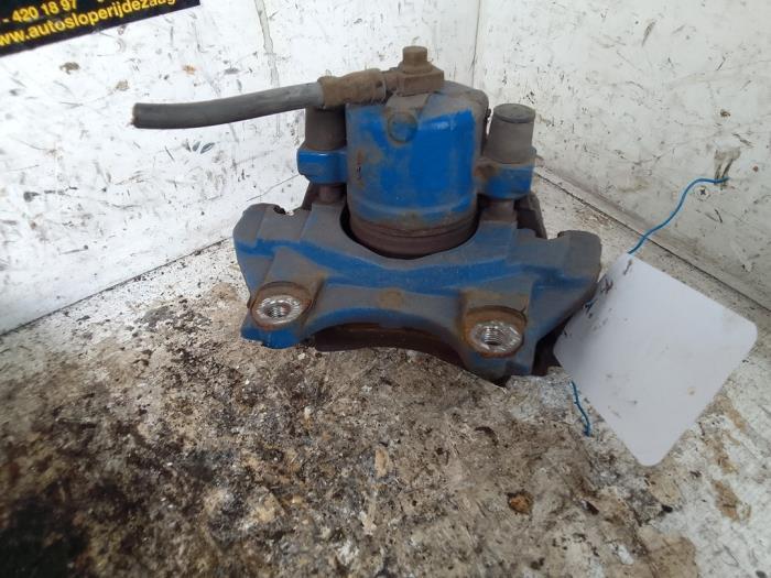Remklauw (Tang) links-voor van een Opel Corsa, Auto-onderdelen, Remmen en Aandrijving, Opel, Gebruikt, 3 maanden garantie, Ophalen of Verzenden