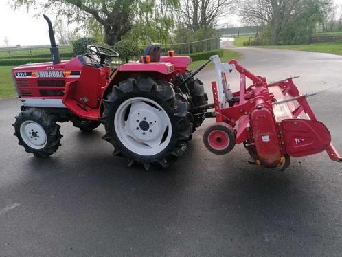 Shibaura P21F Vierwielaangedreven minitractor met grondfrees, Zakelijke goederen, Machines en Bouw | Tuin, Park en Bosbouw, Overige typen