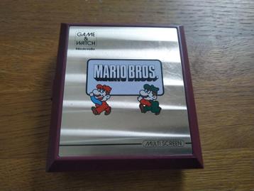 vintage Nintendo game and watch manhole Mario Bros