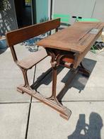Antieke schoolbank in eiken en gietijzer., Antiek en Kunst, Ophalen
