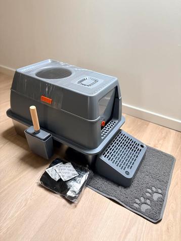 Kattenbak met schep + geurfilterzakjes + mat + 400 zakjes beschikbaar voor biedingen