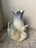 Porseleinen Spaanse vaas, Ophalen