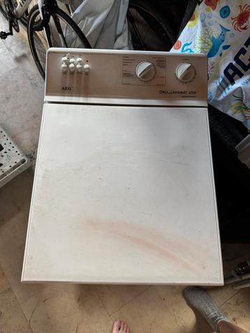 Wasmachine met bovenvak beschikbaar voor biedingen
