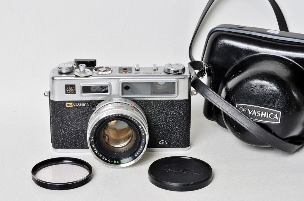 Yashica Électro 35 GS + filtre + étui en cuir : Argentique., TV, Hi-fi & Vidéo, Appareils photo analogiques, Utilisé, Enlèvement ou Envoi