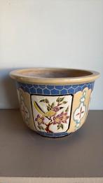 Vintage bloempot, Ophalen