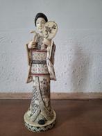 Japanse okimono Geisha, Ophalen