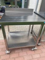 Inox werktafel, Ophalen