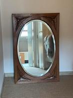 Spiegel met houten kader, Ophalen