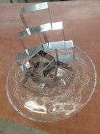 10 Uitsteekvormen in inox, Ophalen