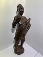 handgesneden houten beeld van een Afrikaanse visser, Ophalen