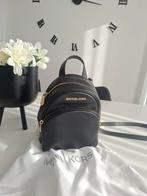 Michael Kors Rugzak, Ophalen