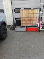 2 lekbakken en mazoutvat, Ophalen