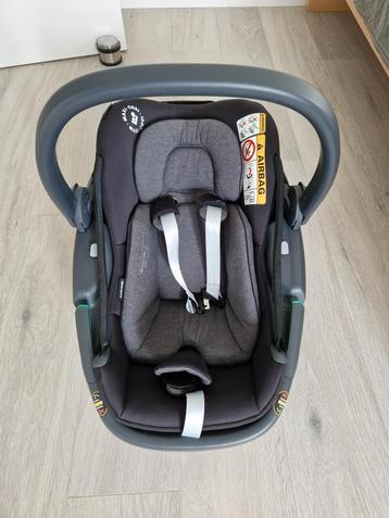 Maxicosi Coral met zonnekap + regenhoes + isofixhouder beschikbaar voor biedingen